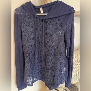 Super cute see through top.